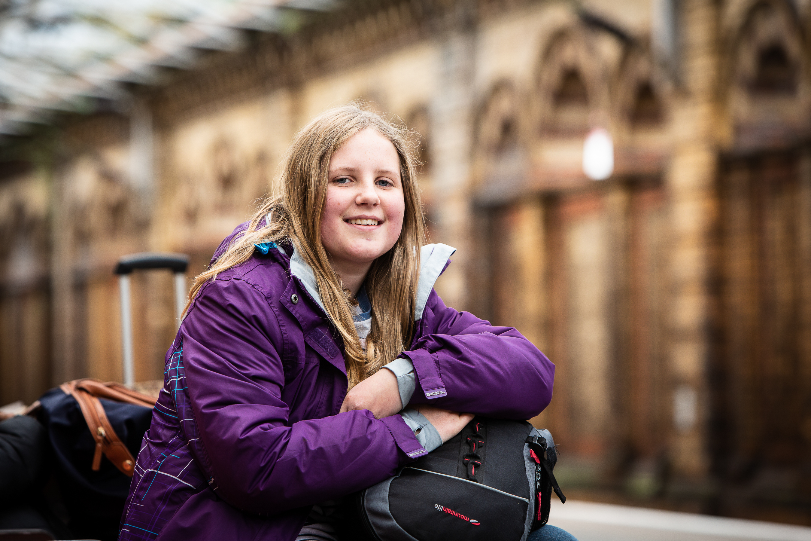 Teenage girl at UK train station